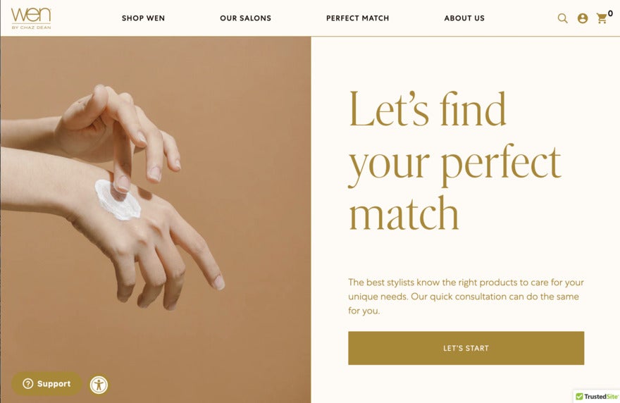 A cream-color website with a large photo of women's hands applying lotion.
