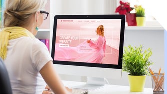 Woman creates a clothing store on her computer