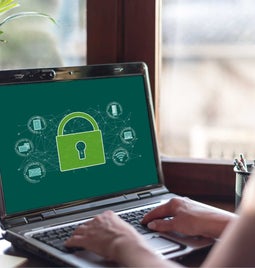 Laptop showing a website with a green lock