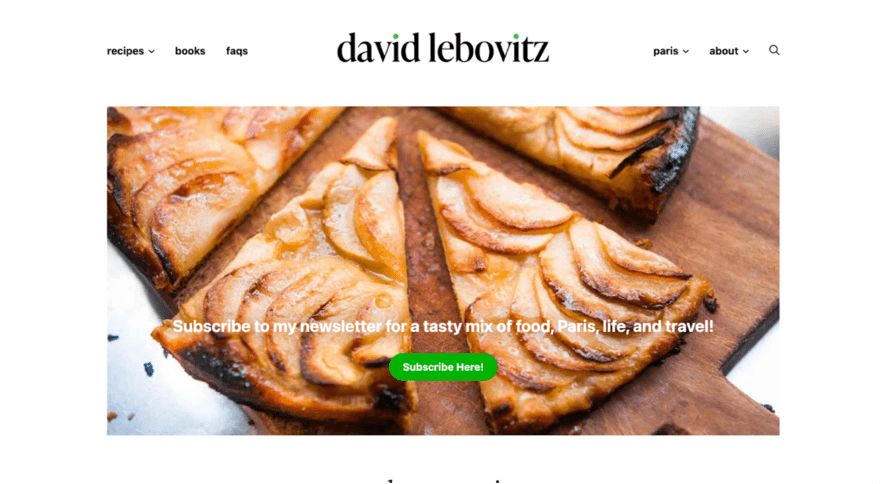 A baked apple tart on a wooden board with a subscription prompt for David Lebovitz's newsletter.