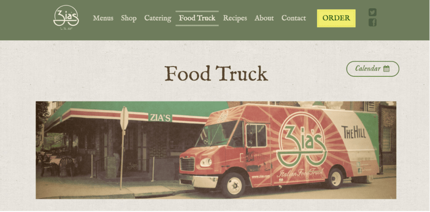 Food truck parked in front of a restaurant with Zia's on the awning.